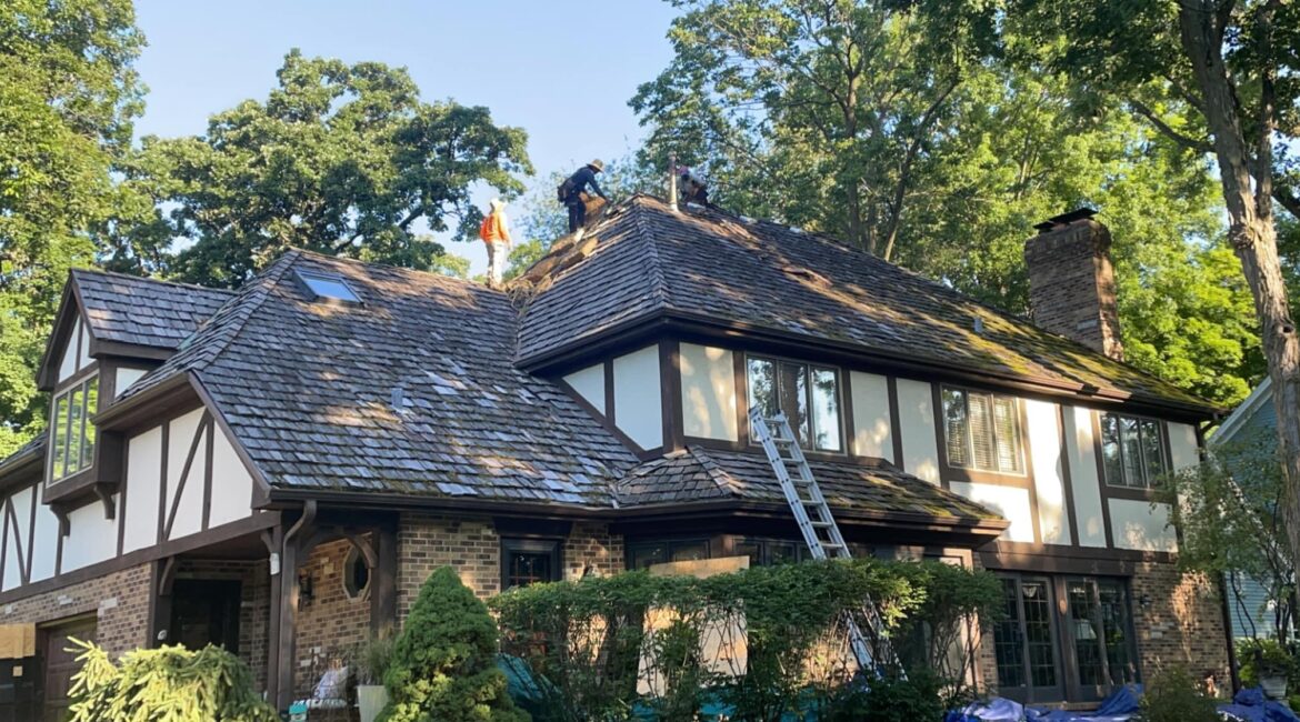 Damaged roof replaced by roofing experts at Mike West Construction, Inc.